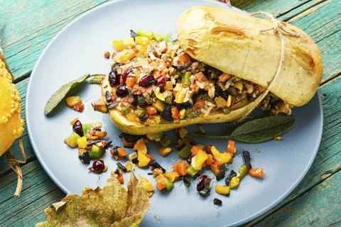 Pumpkin stuffed with rice Stock Photos