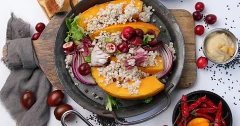 Pumpkin stuffed vegetables. Rotate, top view Stock Footage 224023281