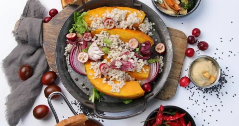 Pumpkin stuffed vegetables. Rotate, top view Stock Footage 225407954