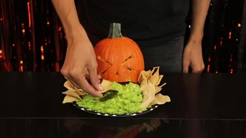 Pumpkin throwing up guacamole 001 Stock Footage 242962929