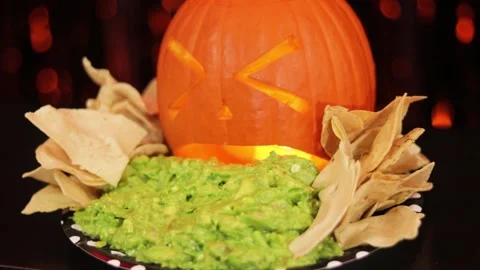 Pumpkin throwing up guacamole 004 Stock Footage 242963050