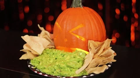 Pumpkin throwing up guacamole 005 Stock Footage 242963081