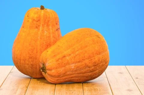 Pumpkins 3d rendering with realistic texture on the wooden table Stock Illustration