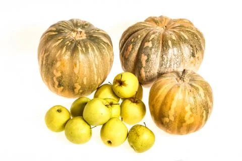 Pumpkins and apples Stock Photos