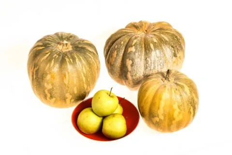 Pumpkins and apples Stock Photos