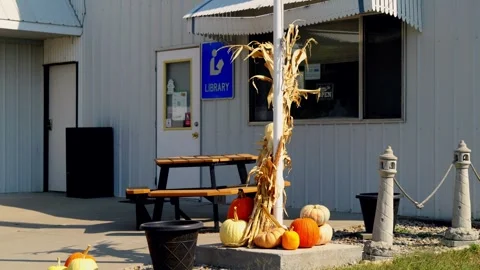 Pumpkins and corn stalks decorating a building entrance in Lebanon Stock-Footage 345530608