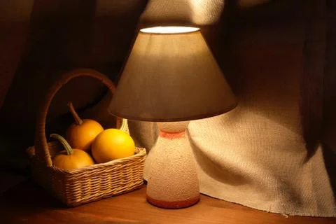 Pumpkins and lamp Stock Photos