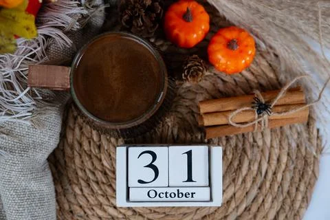Pumpkins and October 31 block with rustic autumn background Stock Photos