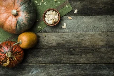 Pumpkins and seeds in Rustic style on wood Foto stock