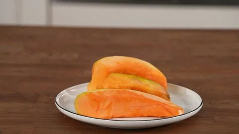 Pumpkins are standing on the plate Stock Footage 183494488