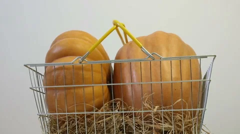 Pumpkins in basket Stock Footage 54770413