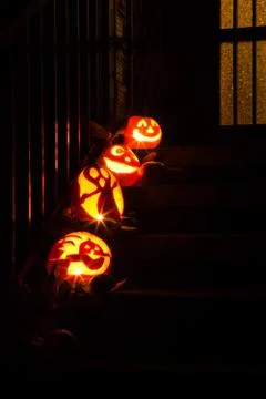 Pumpkins decorations  on a door steep Stock Photos