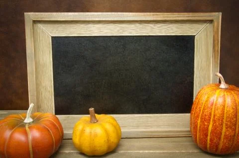 Pumpkins with Empty Chalk Board 스톡 사진