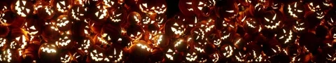 Pumpkins fill the screen with glowing jack-o-lanterns creating a spooky setting Stock Footage 345729754