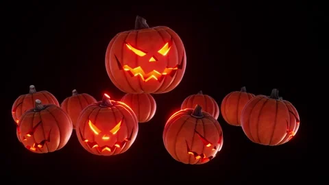 Pumpkins with glowing faces dance in a spooky atmosphere, animated on the beat Stock Footage 345600911