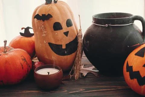 Pumpkins, jack-o-lantern, witch cauldron,bats, spider, candle, ghost, autumn  Stock Photos
