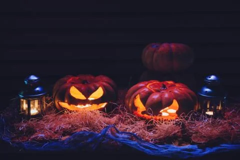 Pumpkins lie on the straw Stock Photos