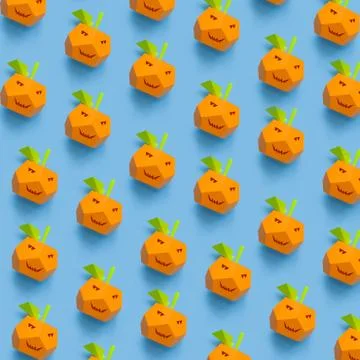 Pumpkins made of paper pattern on blue pastel background. Stock Photos