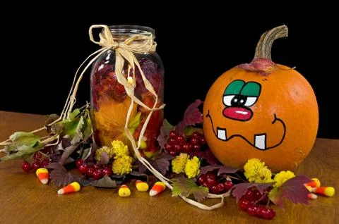 Pumpkins with mason jar Stock Photos