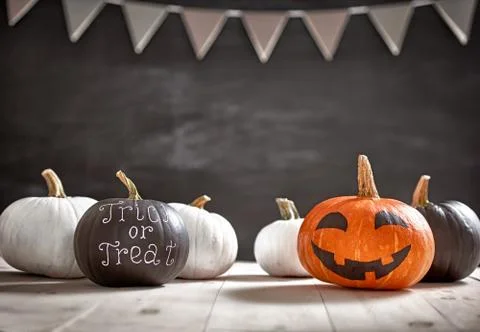 Pumpkins on white table Stock Photos