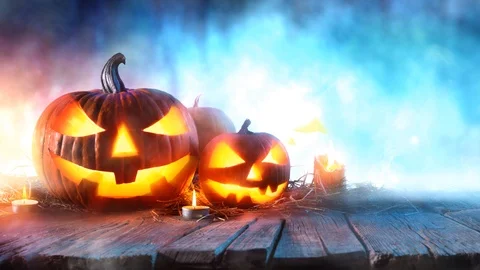 Pumpkins on wood in a spooky forest 库存影片 111482590