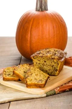 Pumplin walnut bread on cutting board Stock Photos