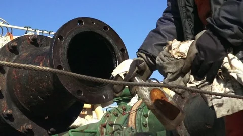 Pumpman cleans fuel meter neck to connect on tanker closeup Stock Footage 121117306