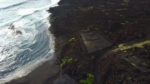 Punaluu, aerial view, Ninole Cove, Kaieie Heiau, Black Sand Beach, Kau, Big I Stock Footage 85669727