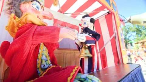 Punch and clown puppet low angle shot Stock Footage 84650893