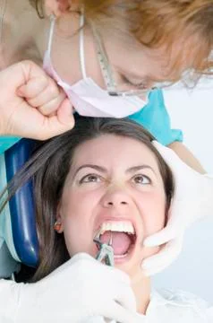 Punch the dentist Stock Photos