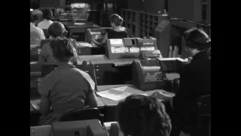 Punched cards are processed in computers and magnetic tape recordings containing Video stock 89874165