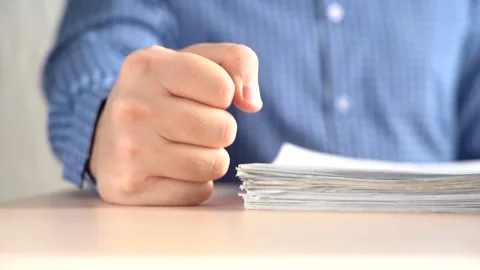 Punched on the table. Stress at work Stock Footage 161334940
