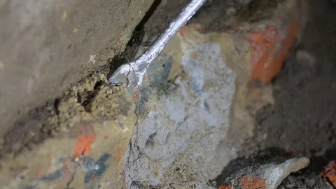 Puncher beats bricks. Construction dismantling Stock Footage 123201753