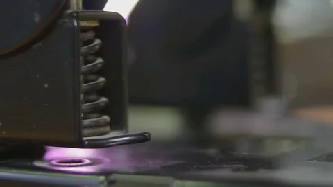 The puncher does a hole in the sheet of paper (macro, a side view) Stock Footage 81787144