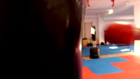 Punching bag on the gym Stockbeeldmateriaal 148834927