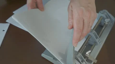 Punching holes 스톡 동영상 10589680