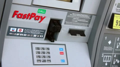 PUNCHING IN NUMBERS AT GAS PUMP Stock Footage 2154758