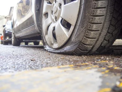  punctured rubber Stock Photos
