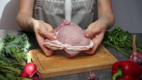 Punctures in a piece of pork meat. Stock Footage 199038030