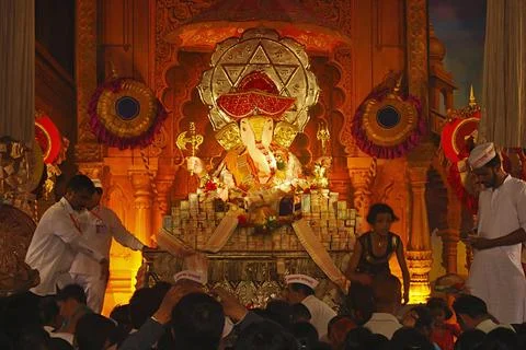 PUNE, INDIA, September 2011, Devotee at Babugenu Navsacha Ganpati during G... Stock Photos