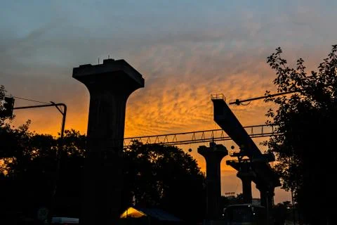 Pune metro railway work in progress on the backdrop of beautiful morning sky. Stock Photos