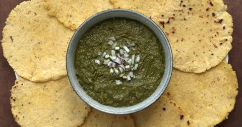 Punjabi Sarson ka saag and makki ki roti meal. Stock Footage 279922159