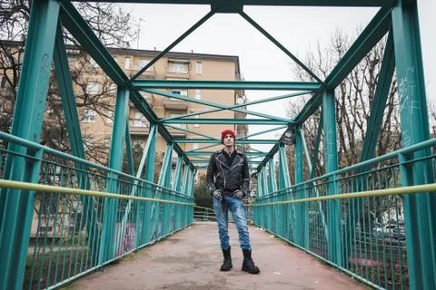 Punk guy posing in the city streets Stock Photos