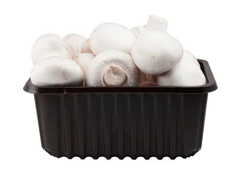 Punnet of button mushrooms Stock Photos