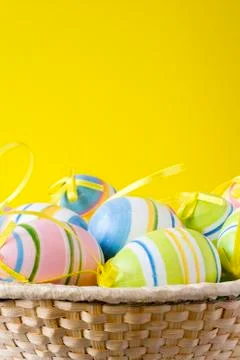 Punnet with colorful easter eggs Stock Photos