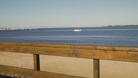 Punta del Este beach boardwalk. Boat in the distance. Uruguay. 스톡 동영상 118044873