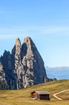 Punta Euringer mountain and a bending scenic trail on Seiser Alm plateau. Ita Stock Photos