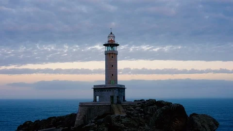 Punta Nariga Lighthouse in Spain at twilight Video stock 88104999