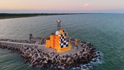 Punta Sabbioni Lighthouse at Sunset on the Adriatic Coast in Italy 스톡 동영상 343191048