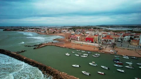 Punta Secca down orbit aerial drone reveal view Montalbano Film movie set Sicily 스톡 동영상 181983939